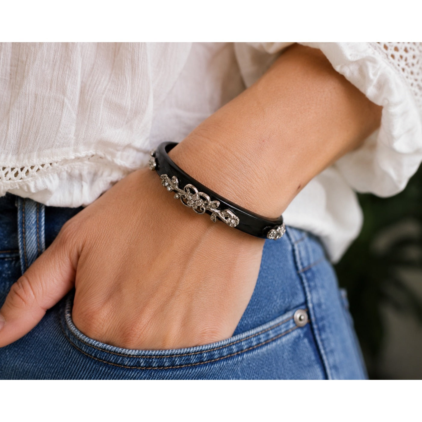 Vintage Black Lucite Bangle Bracelet with Rhinestone Floral Silver Tone Accents 2.5"