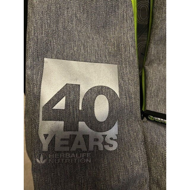 Herbalife Nutrition 40 Years Anniversary Gray Backpack with Green Zippers