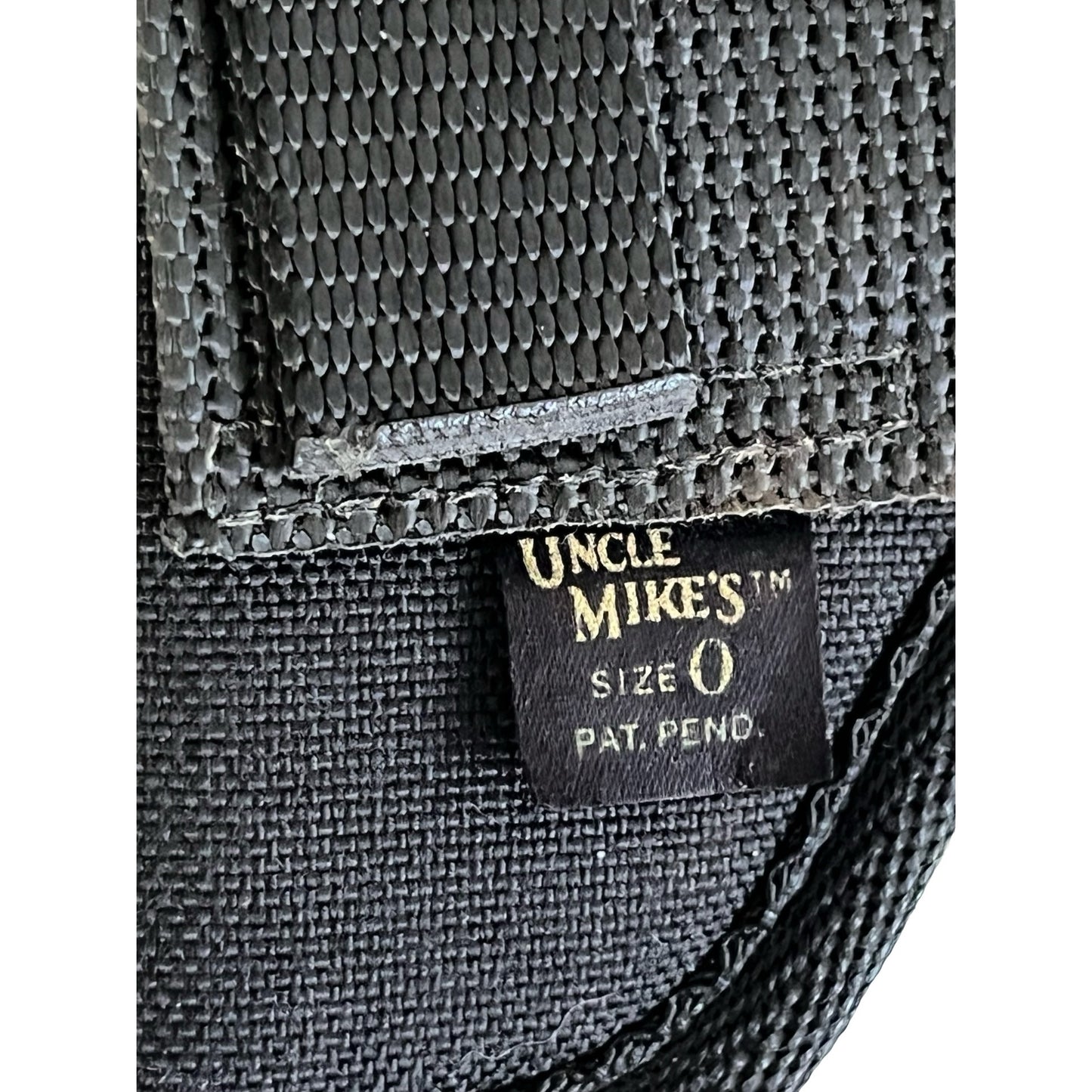 Uncle Mike’s Size 0 Nylon Holster Black Belt Clip Right Hand Conceal Carry