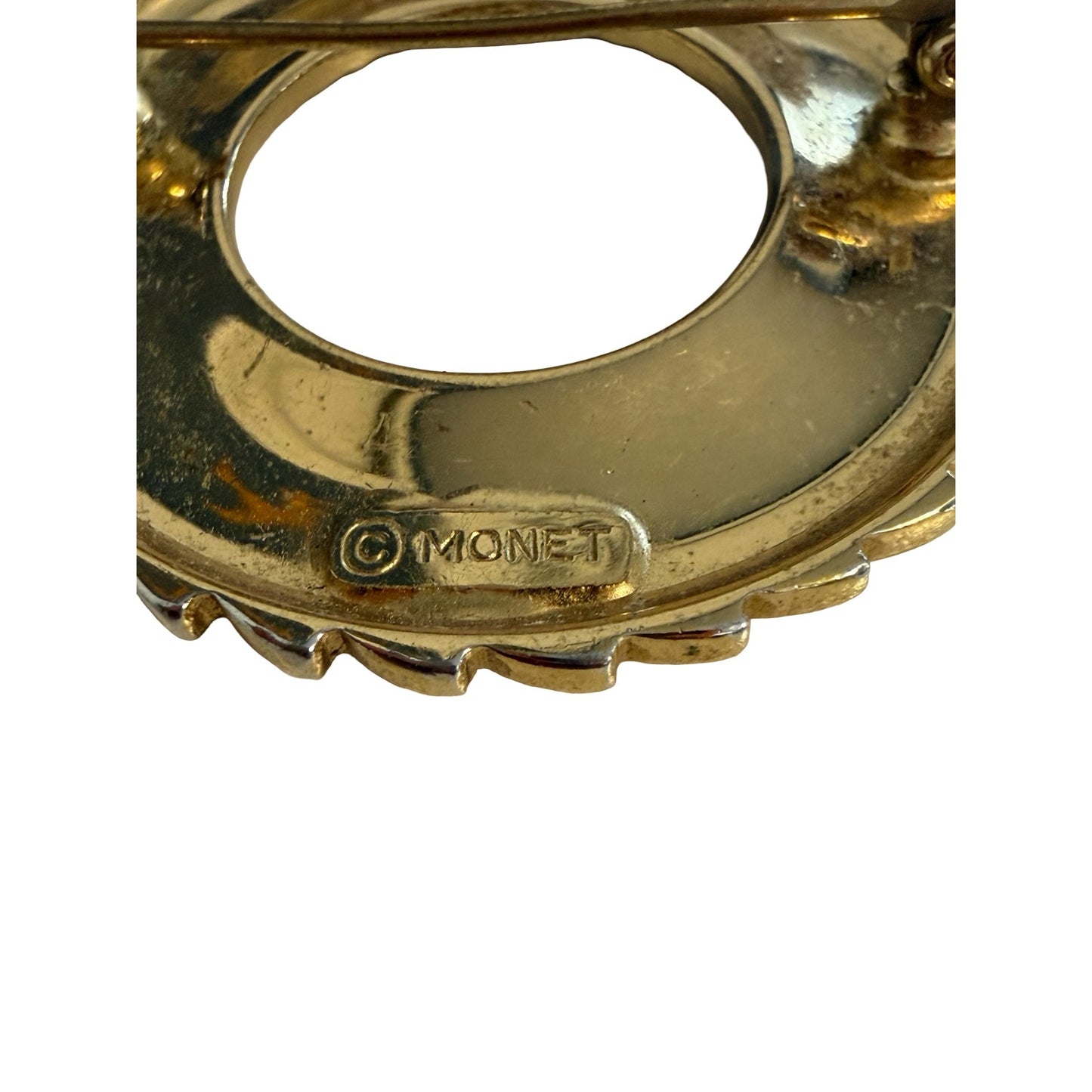 Vintage Monet Gold Tone Open Circle Swirl Brooch Pin Textured Statement Jewelry